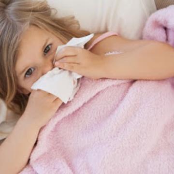 Young girl with a cold