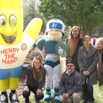 Ace Clean and Henry the Hand with Harvest Festival Attendees